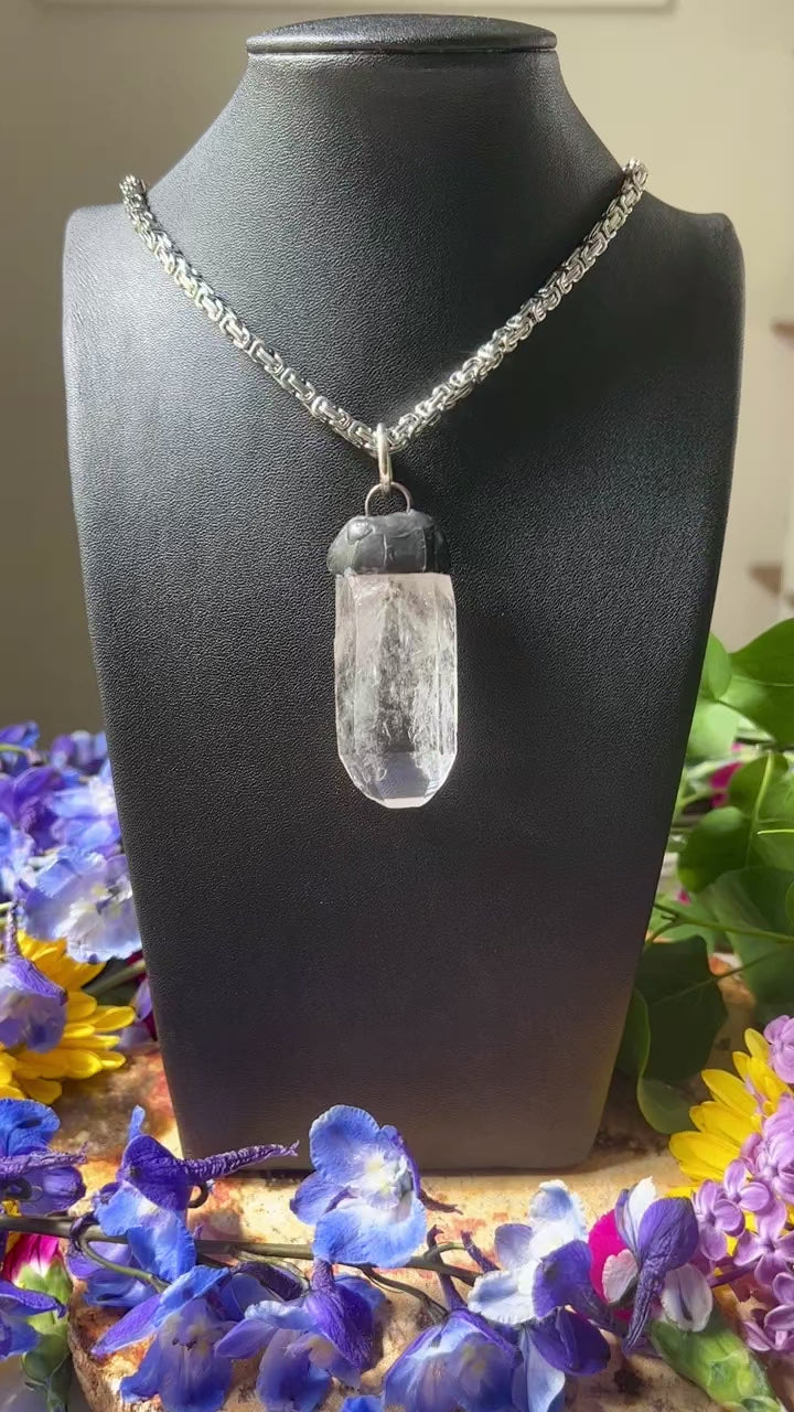 quartz on black bust.