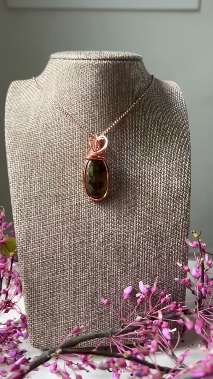 labradorite hanging on linen bust