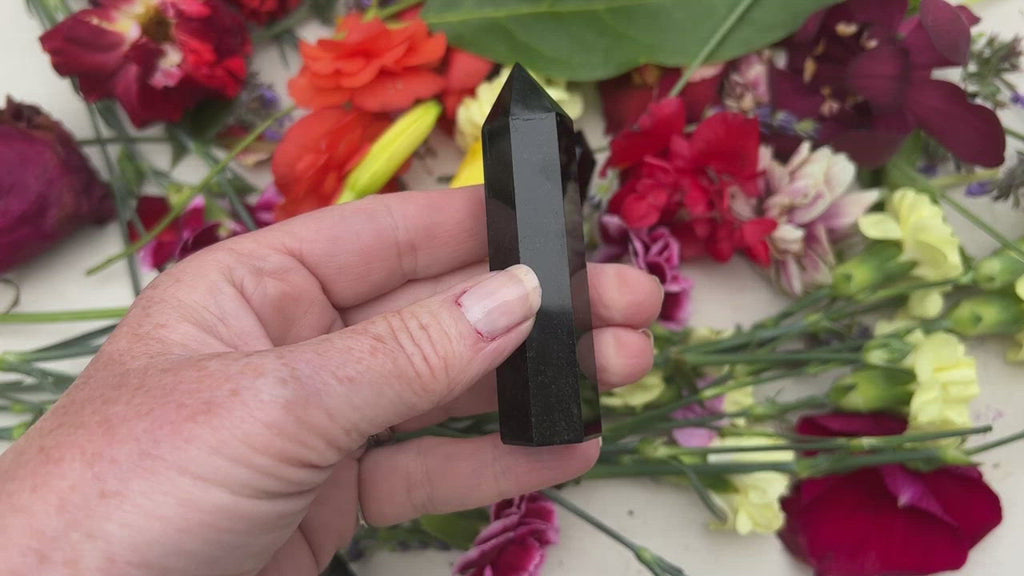 black onyx points on tabletop. 