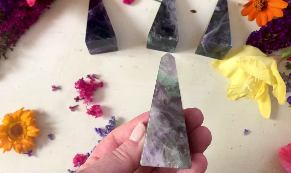 rainbow fluorite small hearts with green black and purple colors about 2 inches big.